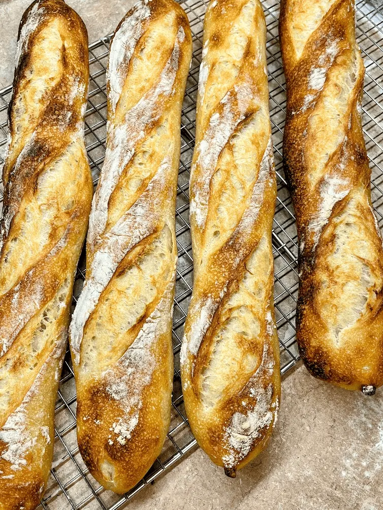 Classic French baguette with crisp crust, open crumb, and overnight flavor development. A gold-standard artisan bread recipe for home bakers.